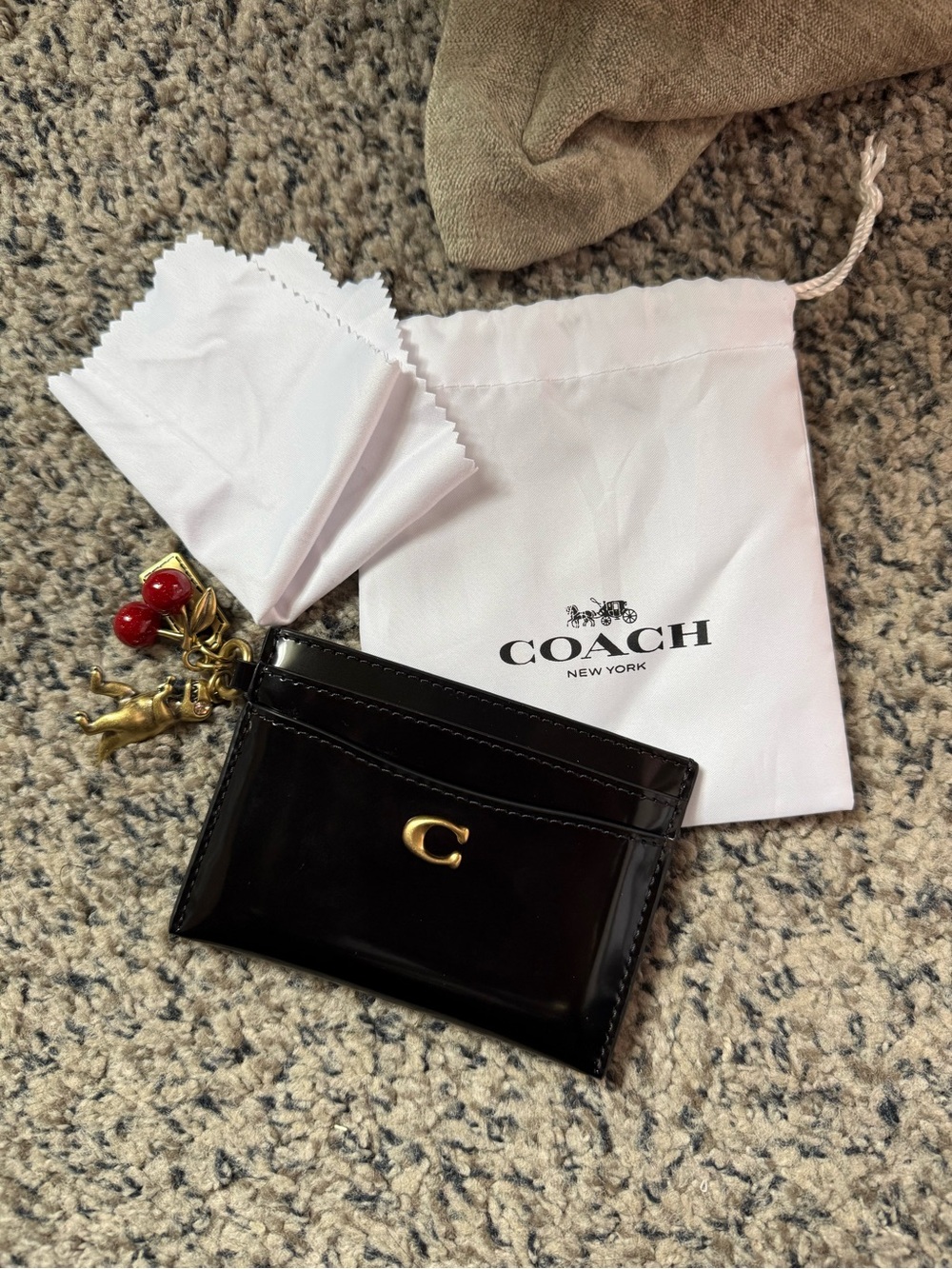 Coach Black Patent Card Holder with Gold C Charm and Red Bead Accents